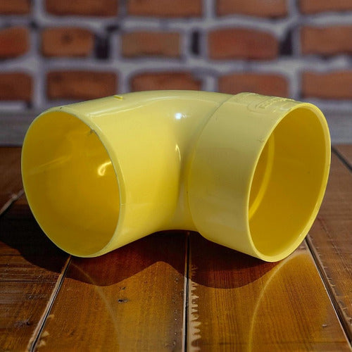 Codo Aguas Negras Amarillo 4'' X 90 Grados